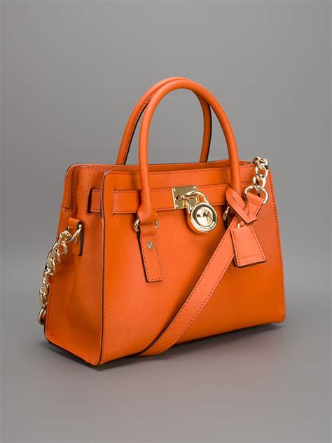 fake orange michael kors bag|michael kors orange handbags.